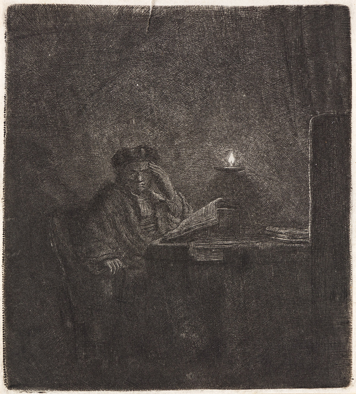 REMBRANDT VAN RIJN A Student at a Table by Candlelight.